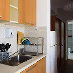 Sunny 1Br Near Obor With Garden Patio And Workspace