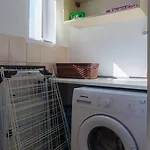 Sunny 1br Near Obor With Garden Patio And Workspace